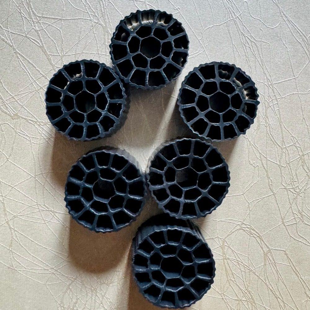 Batch of black MBBR carrier media ready for dispatch