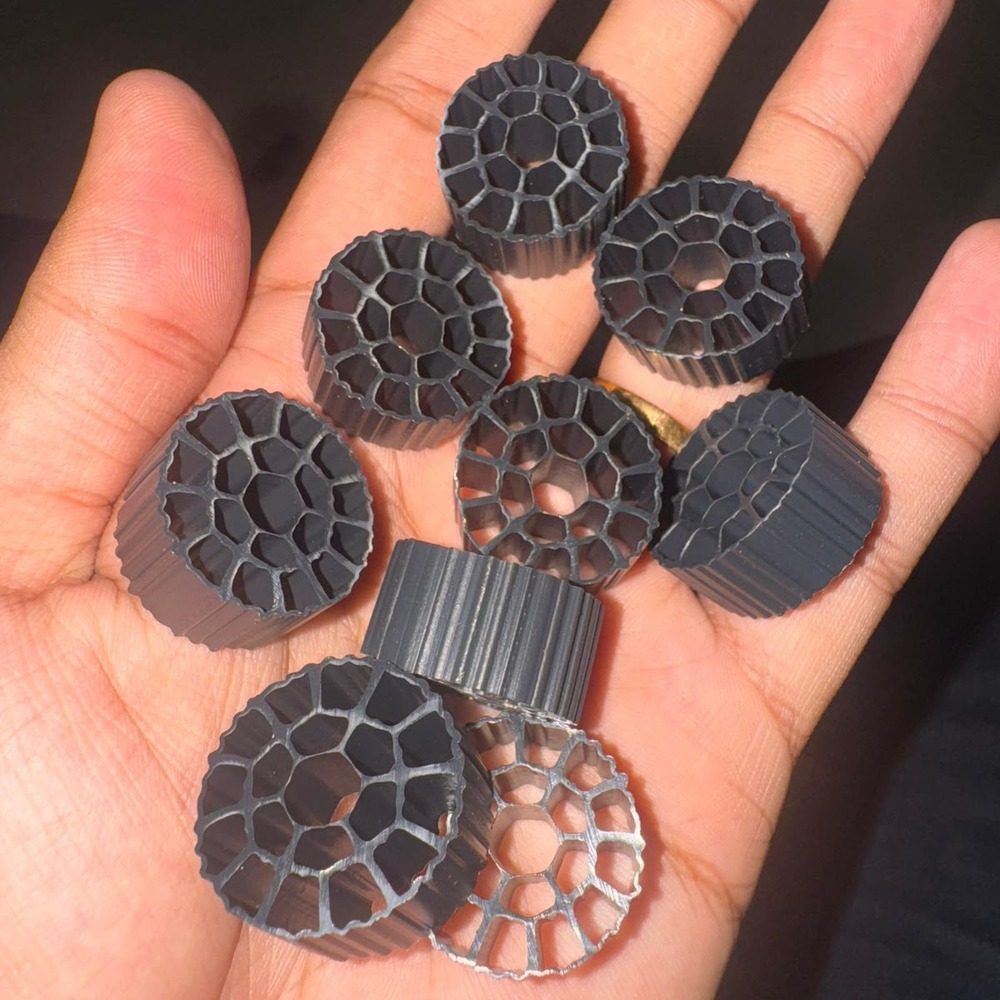 A handful of Apex Aqua Technologies MBBR carrier media